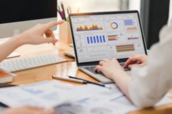 Two,Businesspeople,Or,An,Accountant,Team,Are,Analyzing,Data,Charts, Two,Businesspeople,Or,An,Accountant,Team,Are,Analyzing,Data,Charts,